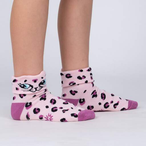 model side view of Check Meowt - Pink Leopard Turn Cuff Socks - Junior